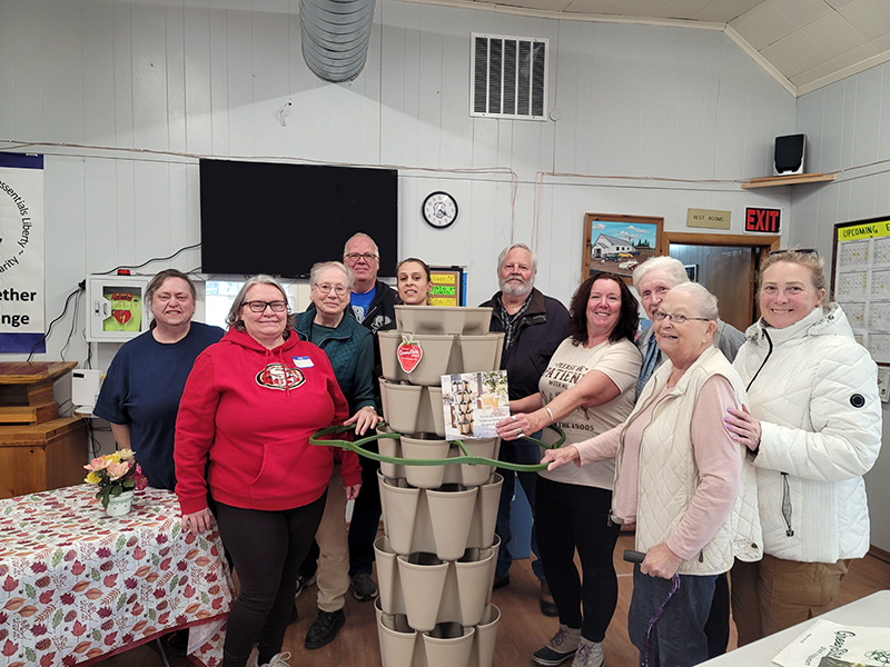 La Pine Grange Class Photo with our new GreenStalk Vertical Planter! 